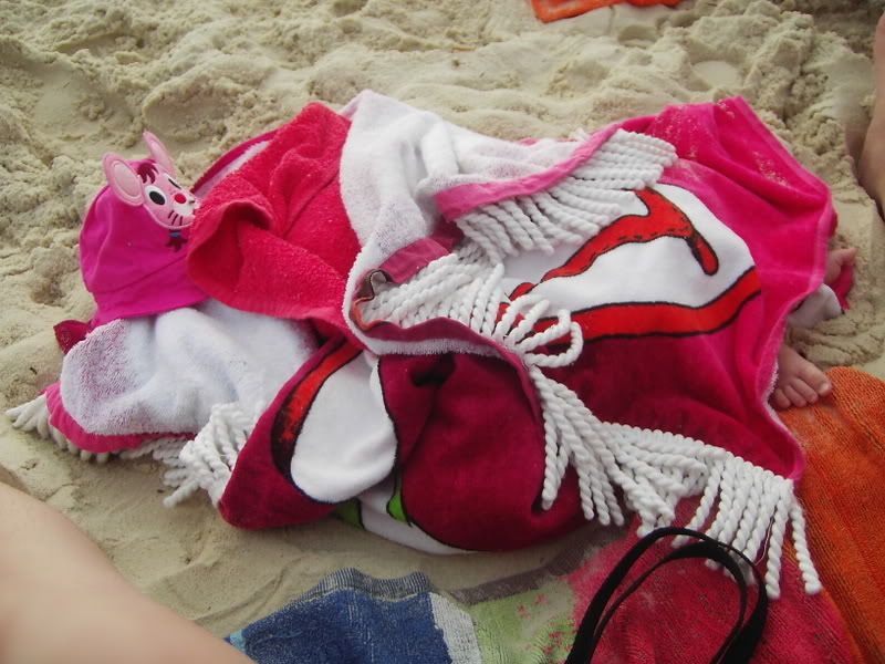Asleep on the beach