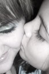 EmMel2.jpg kissing sisters image by karmagenie