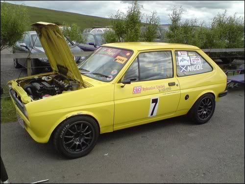 heres a track car fiesta of a mate of mine black top zetec throttle boddys 