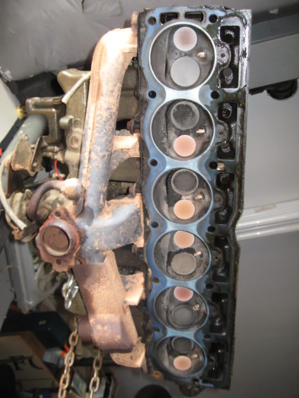 Old Head Removed As An Assembly With The Intake And Exhaust Still Attached